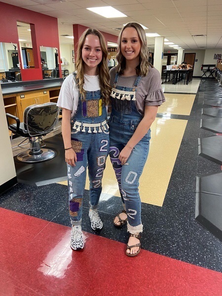  Cierra & Sienna wearing their senior overalls @cosmo!