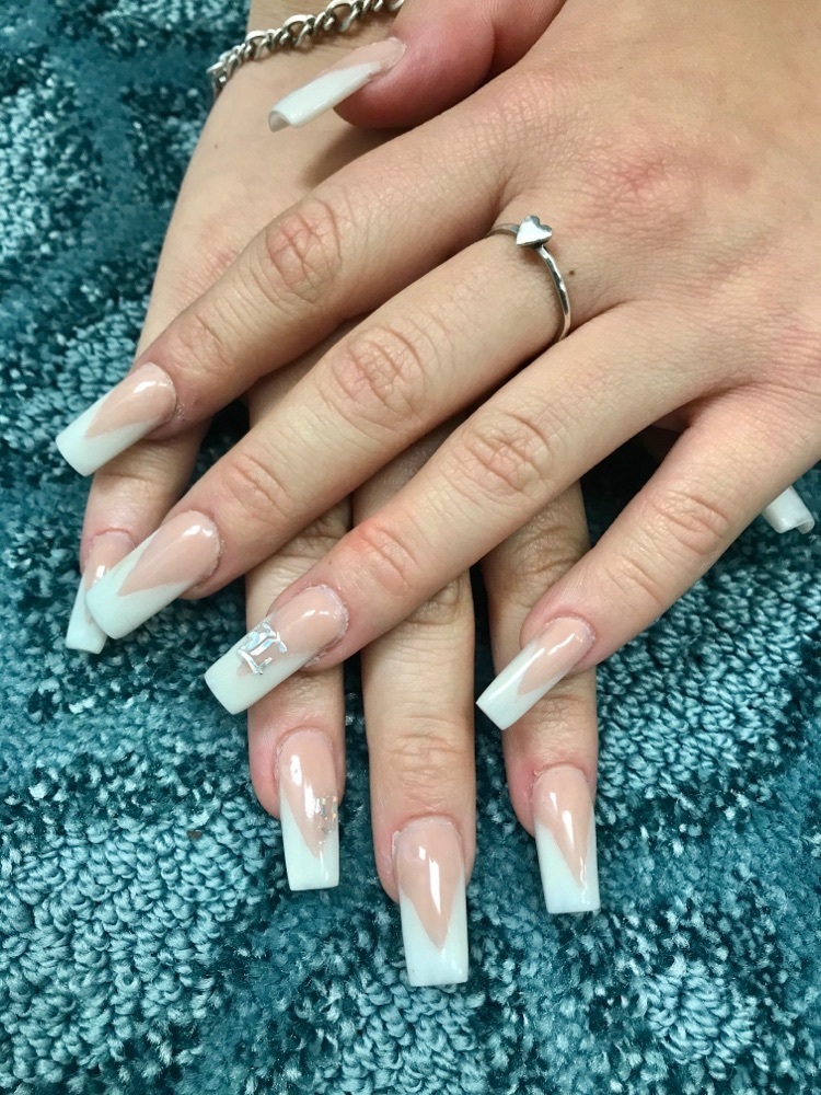 students now offer clients acrylic nails 
